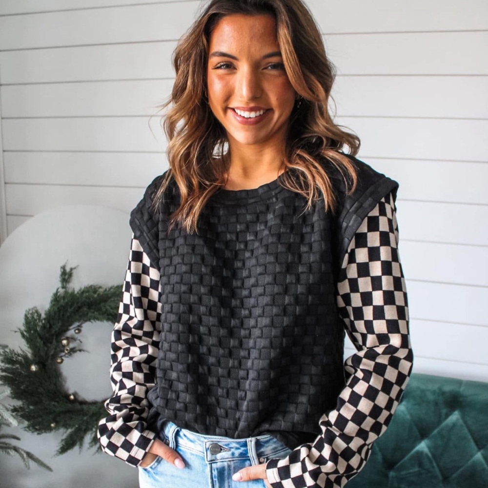 Short in length sweater
